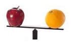 Image of apple and orange on a scale